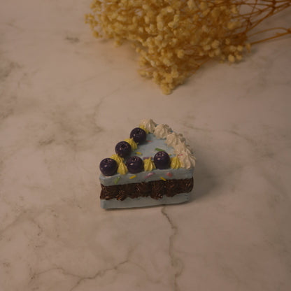 Handcrafted Artistic High-Temperature Firing of Triangular-Sliced Blueberry Ceramic Cake