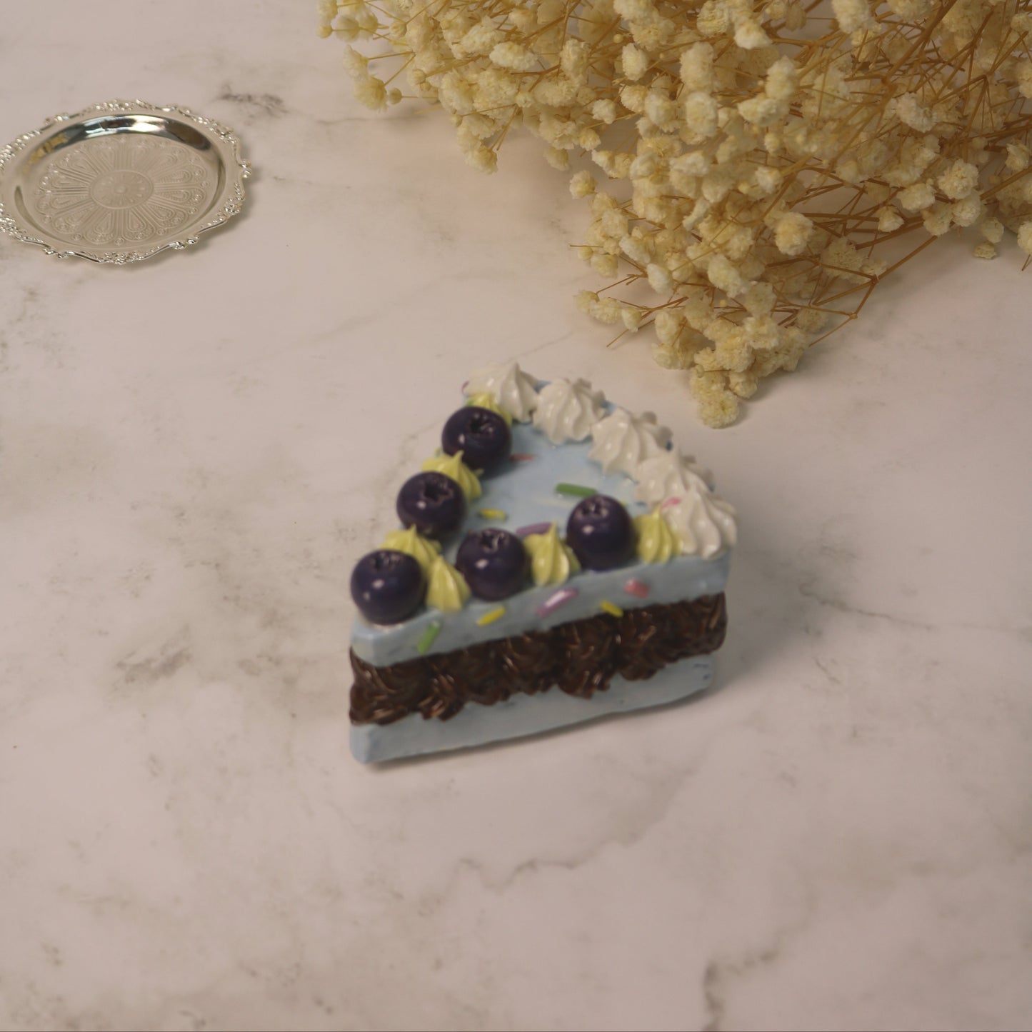Handcrafted Artistic High-Temperature Firing of Triangular-Sliced Blueberry Ceramic Cake