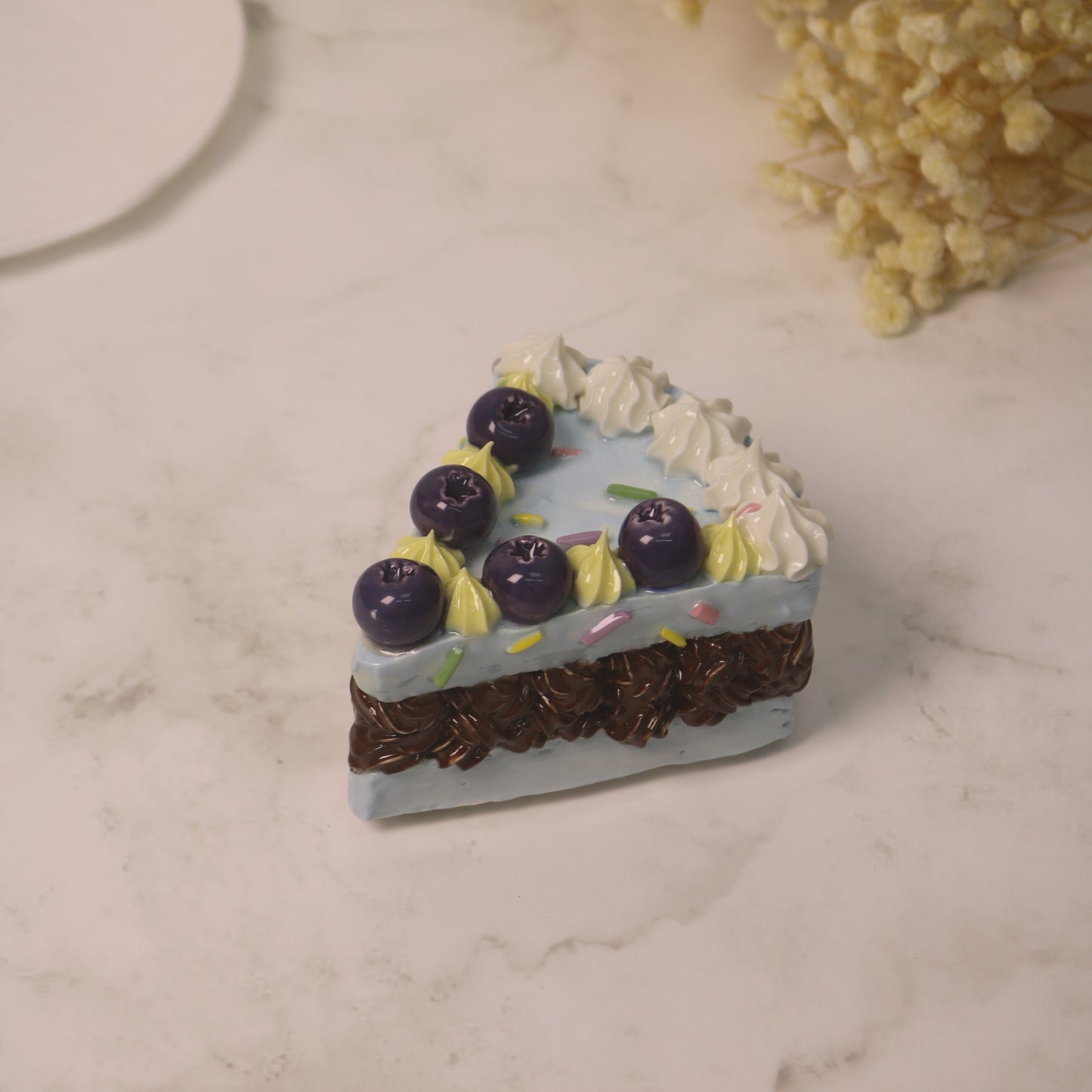 Handcrafted Artistic High-Temperature Firing of Triangular-Sliced Blueberry Ceramic Cake