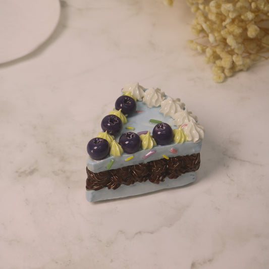 Handcrafted Artistic High-Temperature Firing of Triangular-Sliced Blueberry Ceramic Cake