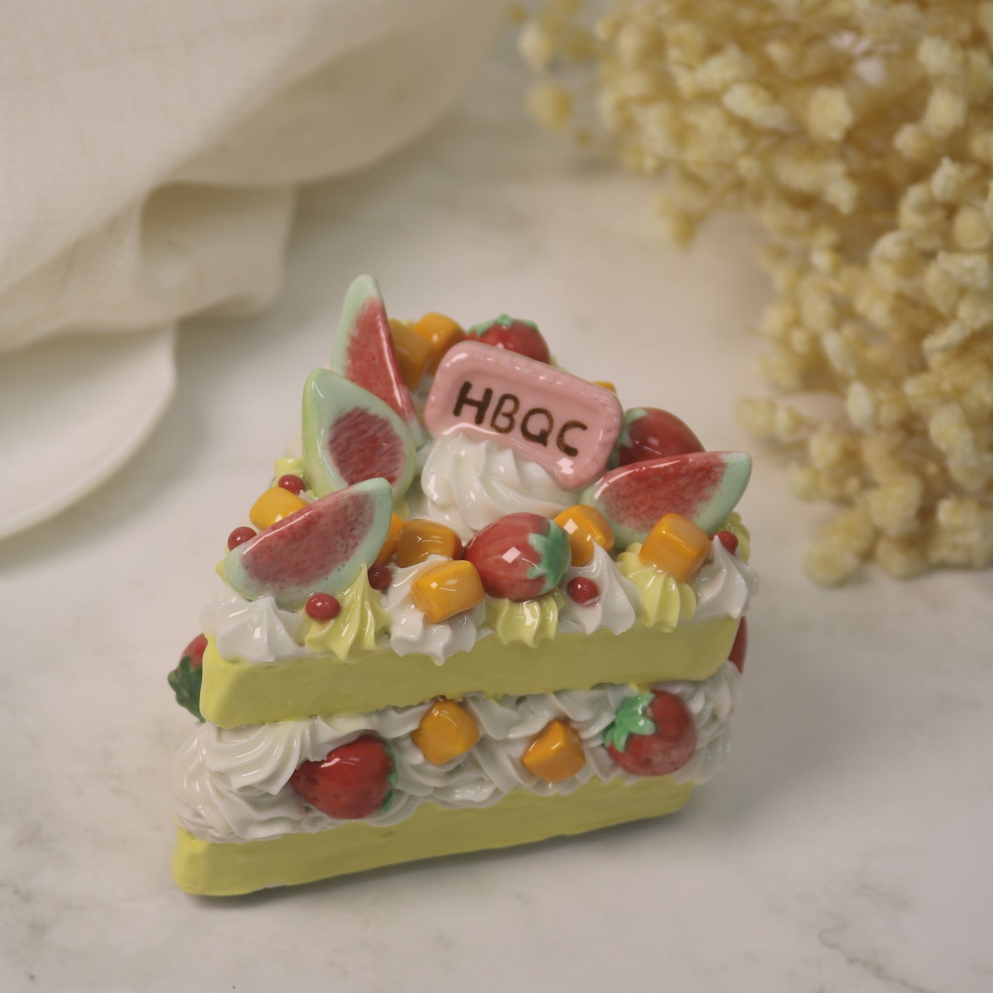 Handcrafted Artistic High-Temperature Firing of Triangular-Sliced Strawberry Ceramic Cake