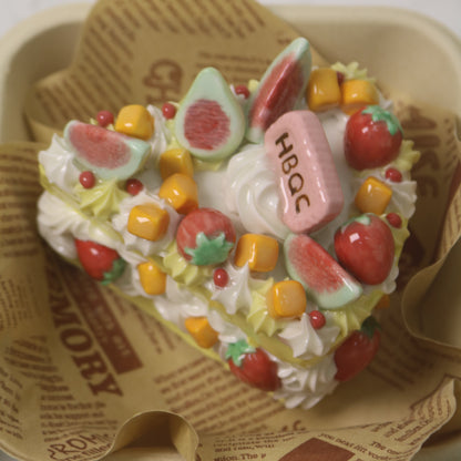 Handcrafted Artistic High-Temperature Firing of Triangular-Sliced Strawberry Ceramic Cake