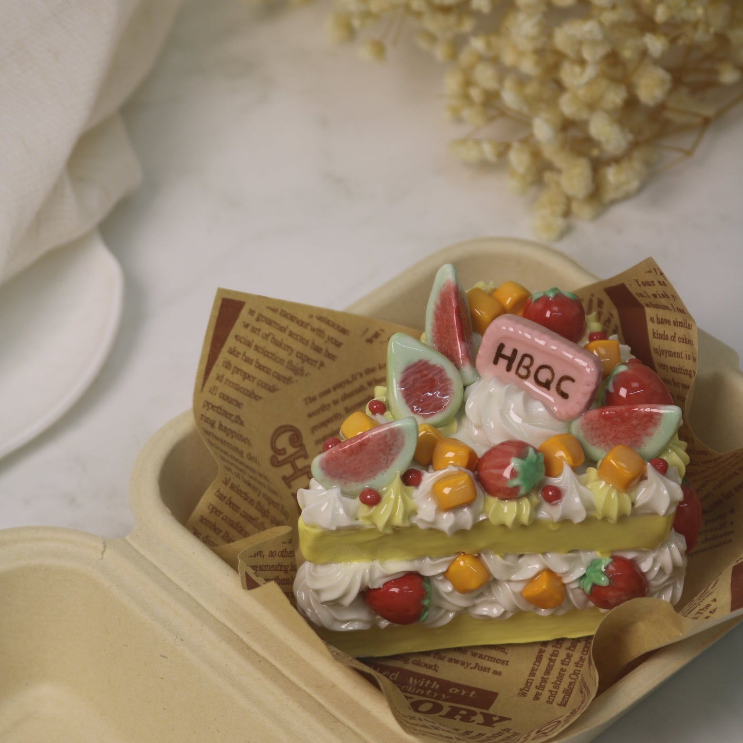 Handcrafted Artistic High-Temperature Firing of Triangular-Sliced Strawberry Ceramic Cake