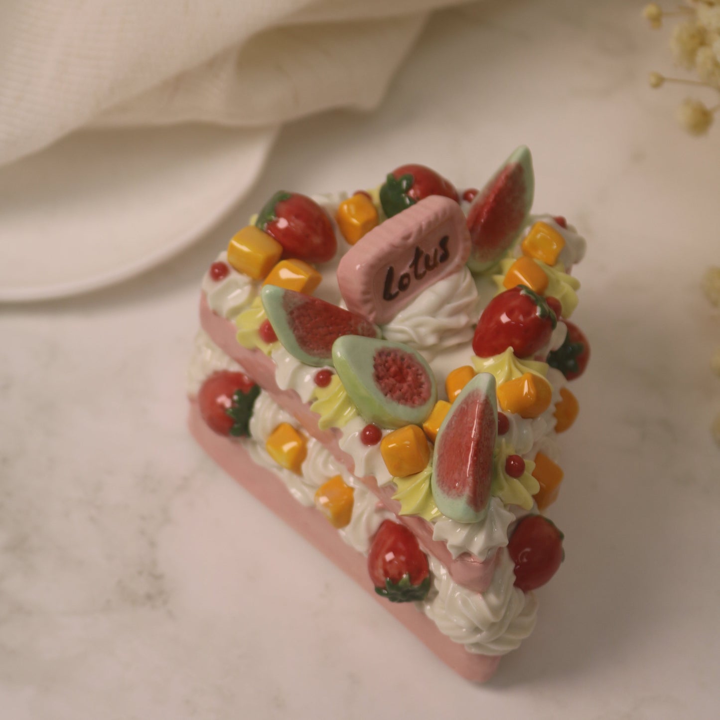 Handcrafted Artistic High-Temperature Firing of Triangular-Sliced Strawberry Ceramic Cake